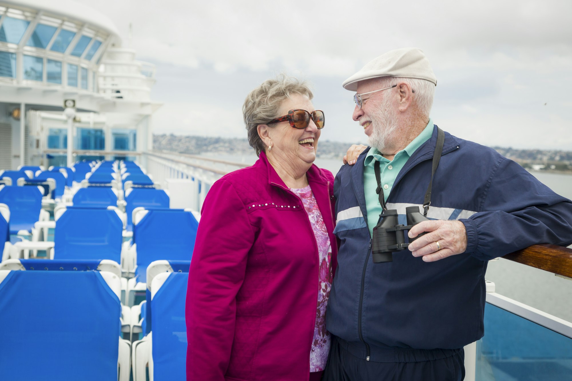 Senior Couple Enjoying The Deck of a Cruise Ship